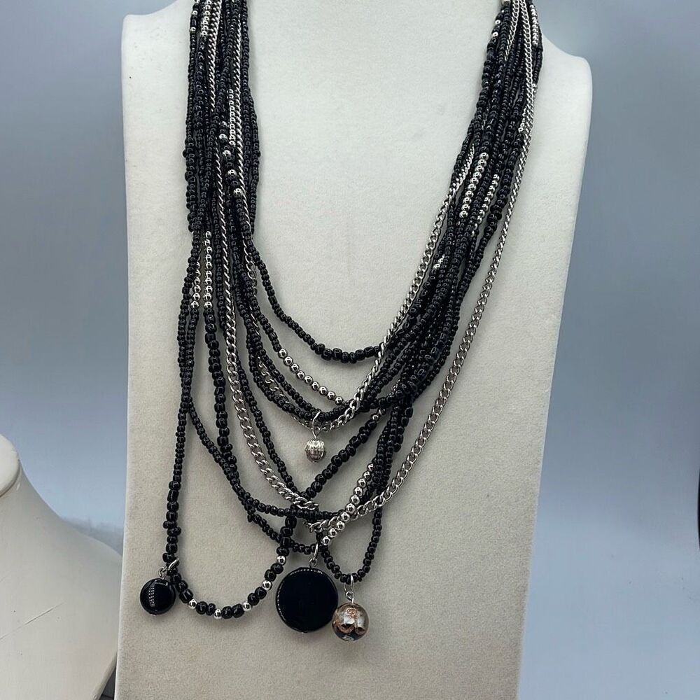 Erica Lyons 60” 5 strand black & silver beaded necklace.